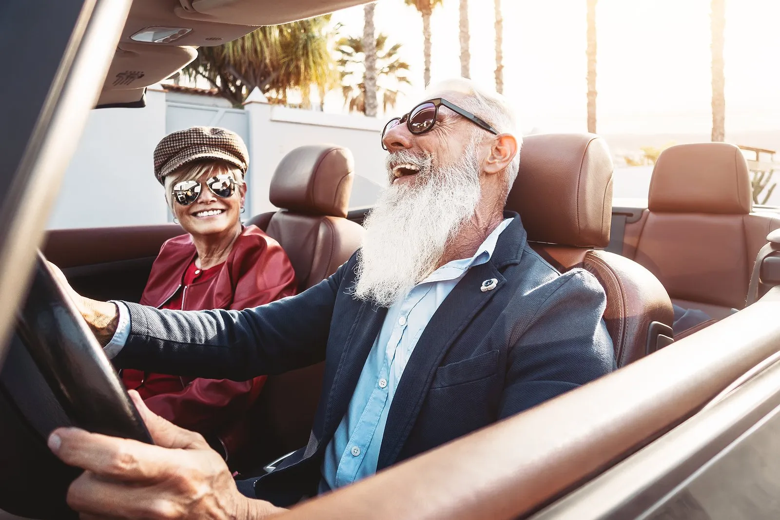 Happy Senior Couple Having Fun On New Convertible Car - Mature P